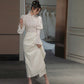 Traditional Chinese white cheongsam wedding dress.