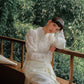 Traditional Chinese white cheongsam wedding dress.