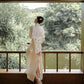 Traditional Chinese white cheongsam wedding dress.