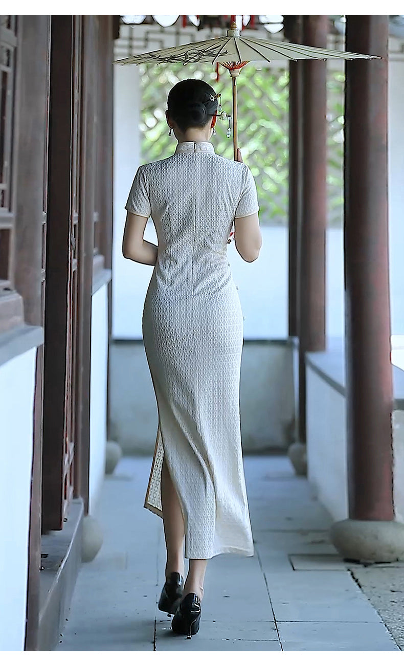 Traditional Chinese cheongsam dress. White cheongsam.