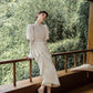 Traditional Chinese white cheongsam wedding dress.