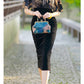 Traditional Chinese dress. Black velvet Cheongsam and shawl. Elegant evening dresses.