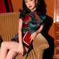 Traditional satin floral cheongsam. Green qipao. Custom dresses.