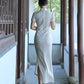 Traditional Chinese cheongsam dress. White cheongsam.