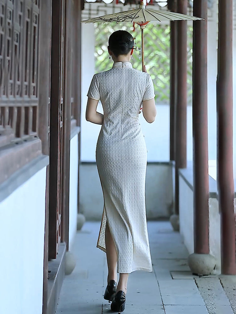 Traditional Chinese cheongsam dress. White cheongsam.