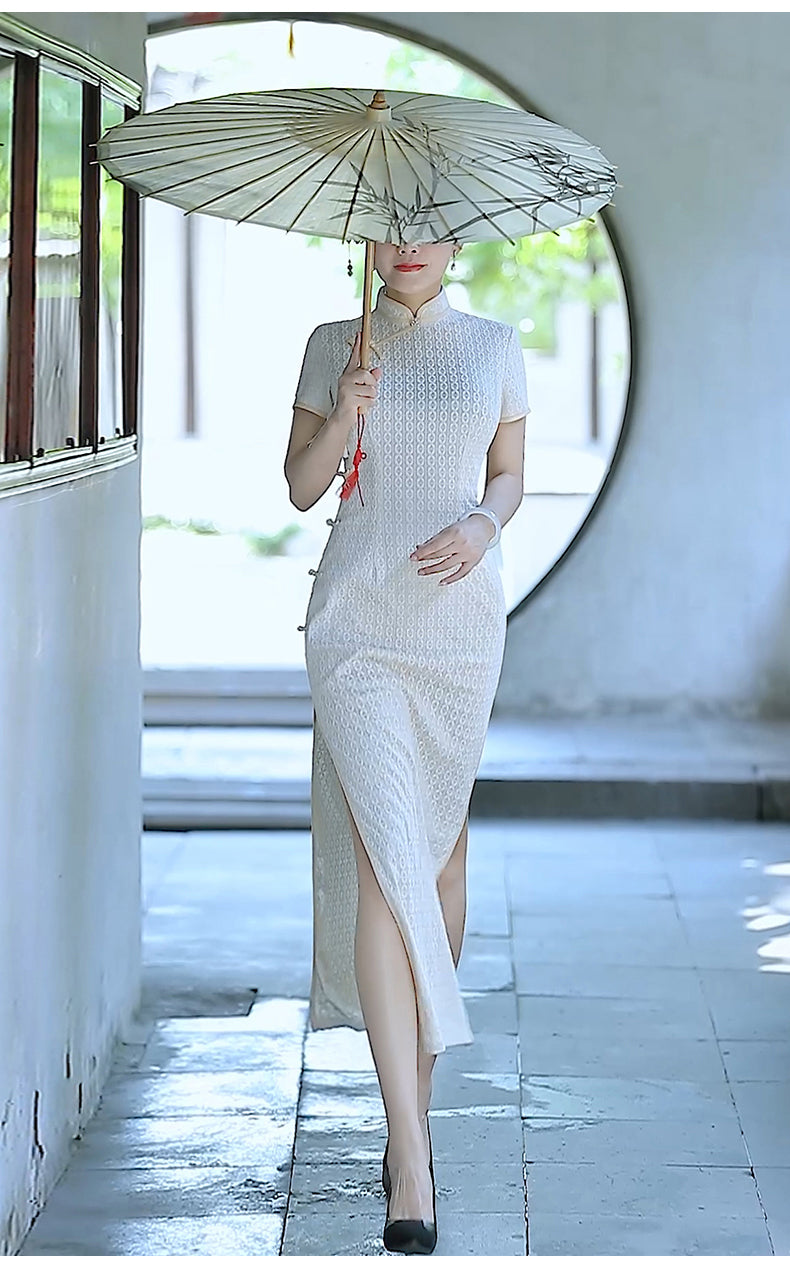 Traditional Chinese cheongsam dress. White cheongsam.