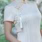 Traditional Chinese cheongsam dress. White cheongsam.